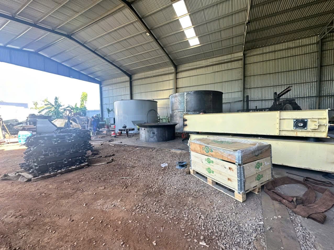ISB crates delivered directly to a customer's plant, with the technical team on site for installation support